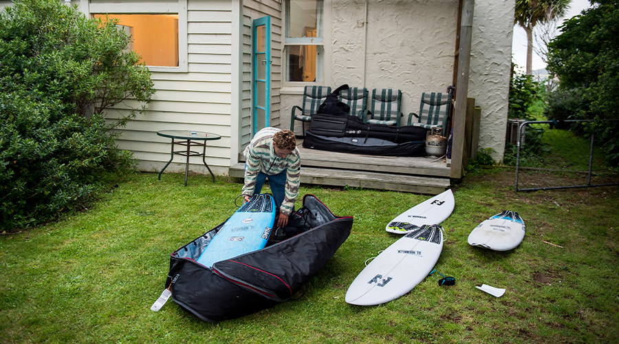 how to pack a surfboard